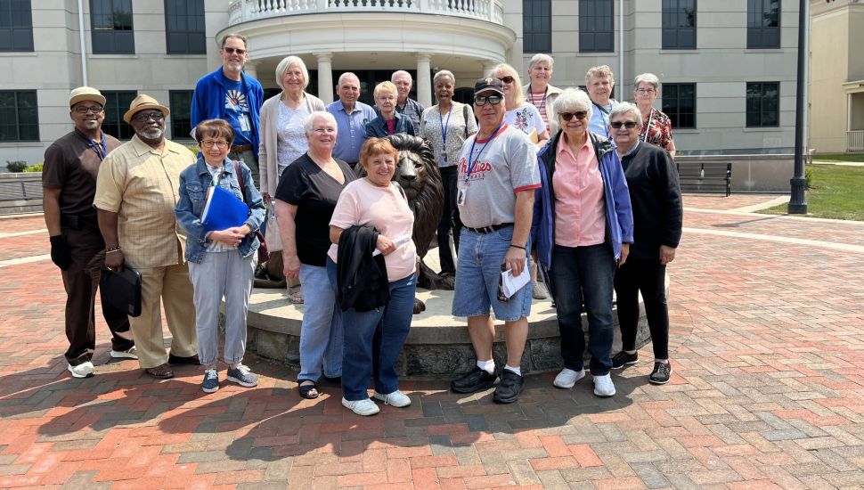 Participants in Widener University's Osher Lifelong Learning Institute, or OLLI, pose for a group photo.