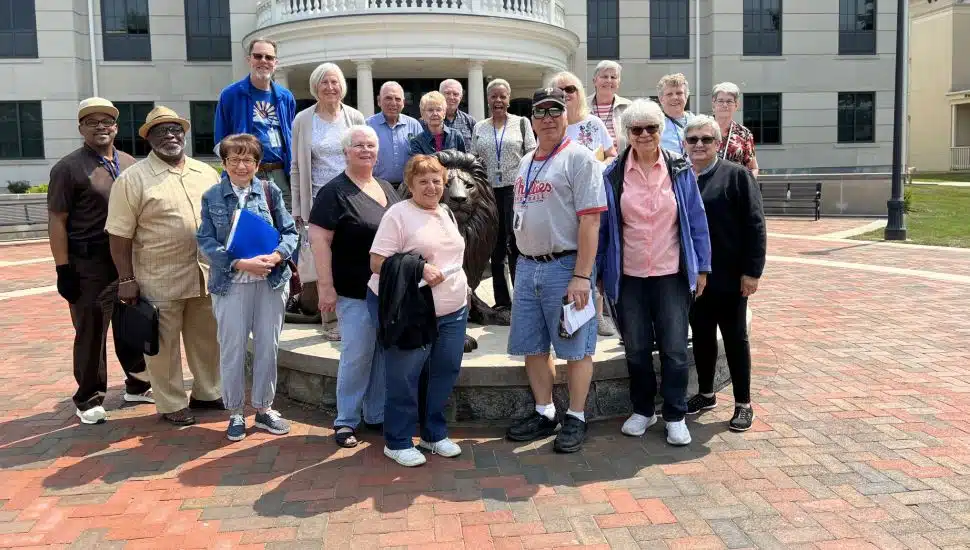 Participants in Widener University's Osher Lifelong Learning Institute, or OLLI, pose for a group photo.