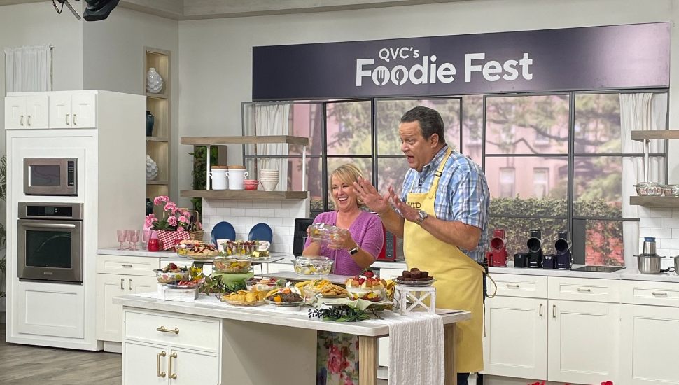 QVC hosts filming in a kitchen