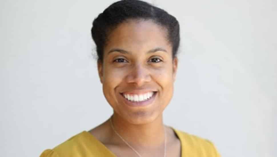 Portrait of Dr. Christa Heyward, Delaware County Community College student and appointee to the Pennsylvania State Board of Higher Education, smiling against a light background.