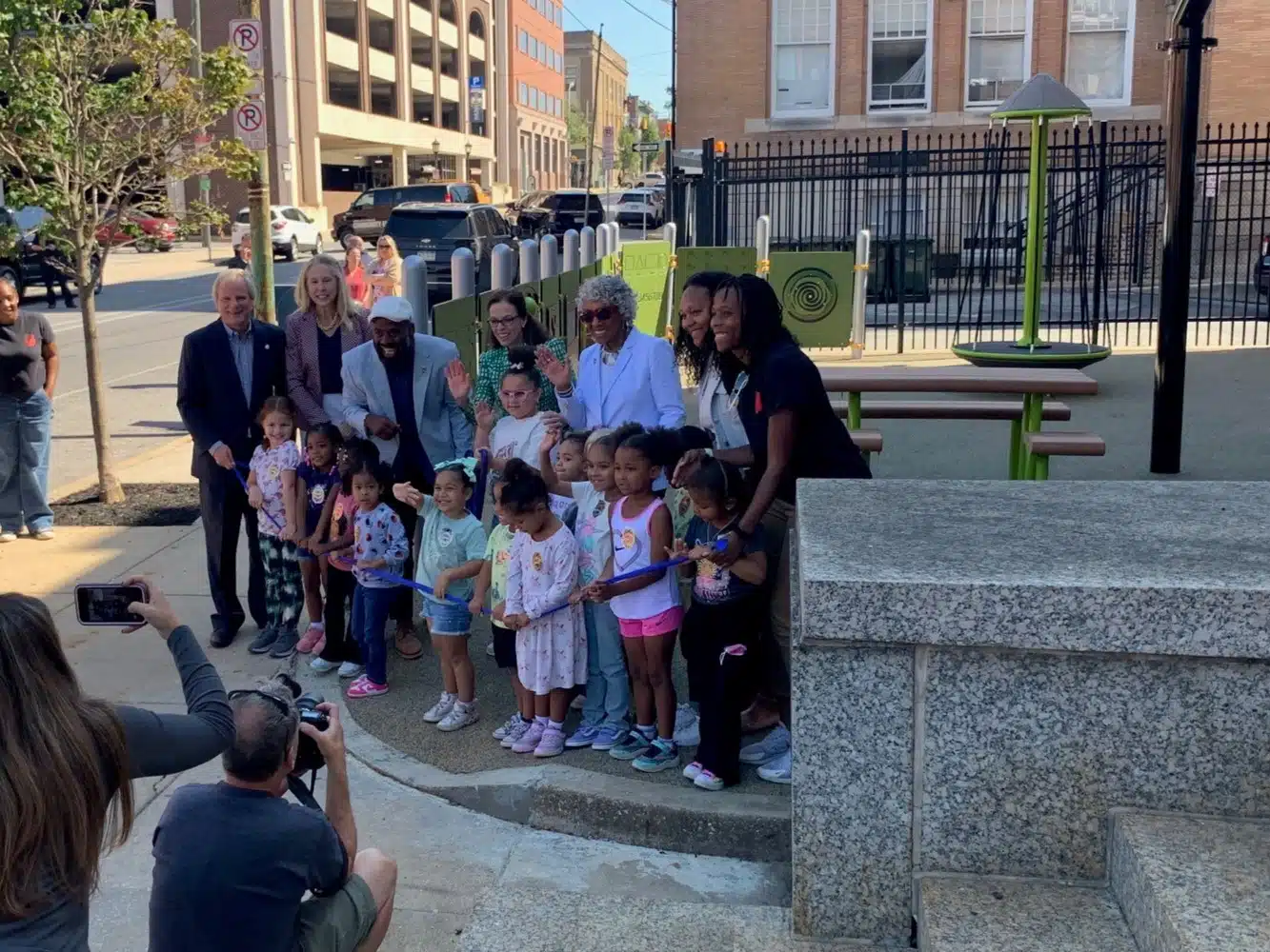 Children, parents and officials gather at the new pocket park outside York City Police headquarters.