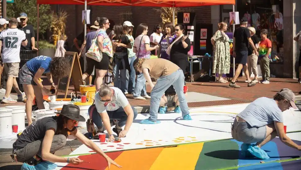 Volunteers are busy creating the Pride crosswalk in Media Borough.