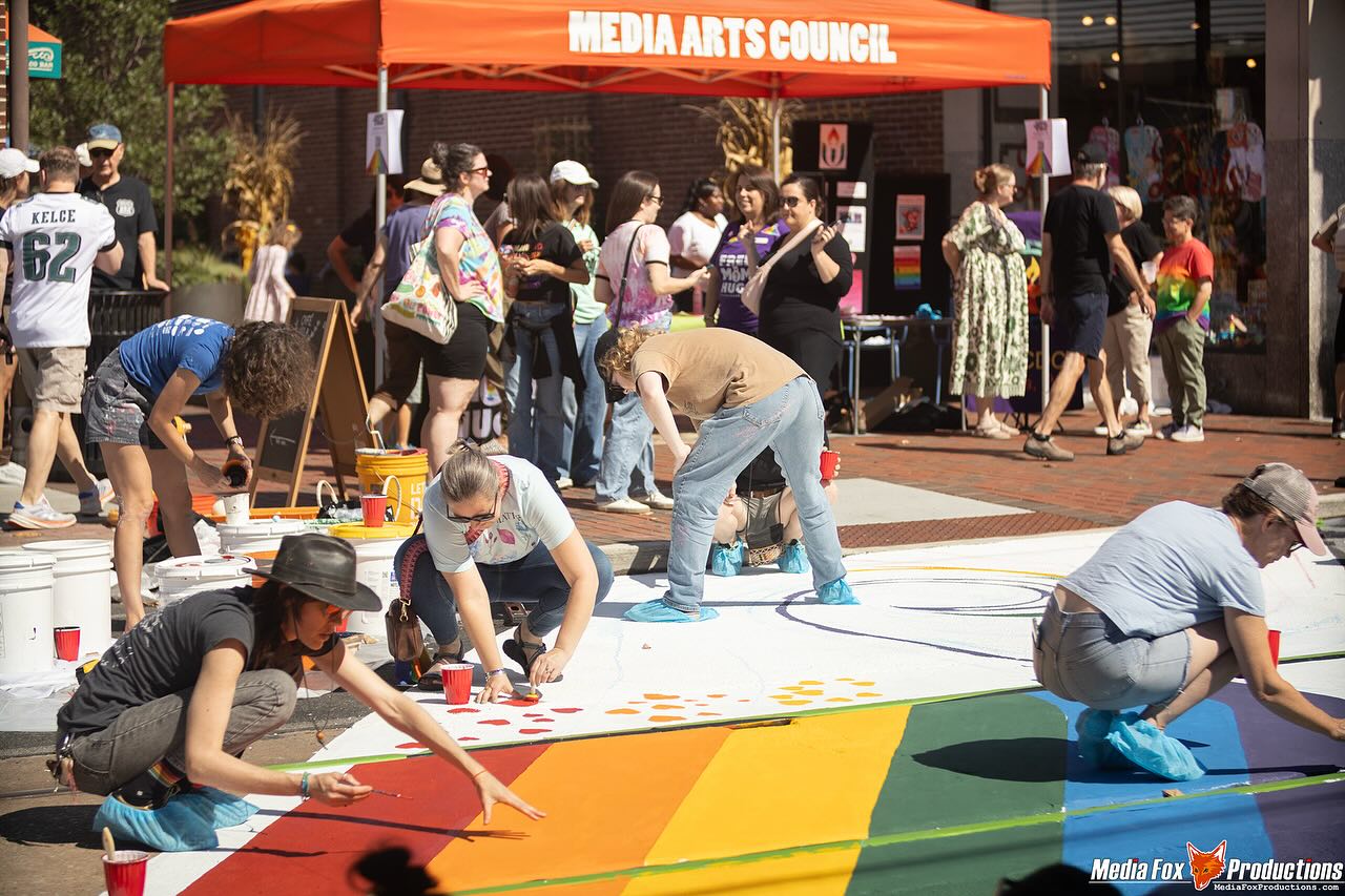 Volunteers are busy creating the Pride crosswalk in Media Borough.