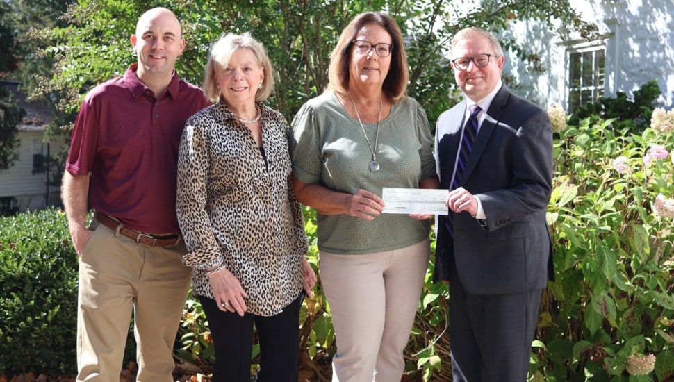 Check presentation to support new scholarship.