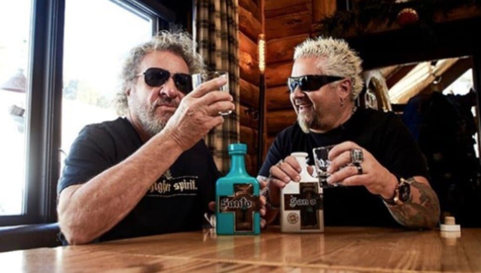 Sammy Hagar and Guy Fieri sip their Santos Tequila.