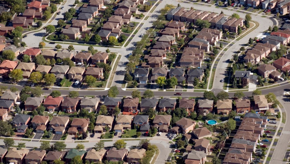 An aerial view of a developed neighborhood.