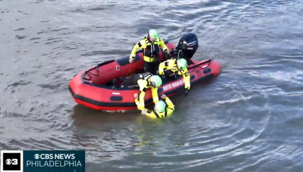 Chester Bureau of Fire firefighters rescue one of their own from the Delaware River in a swift water rescue simulation.