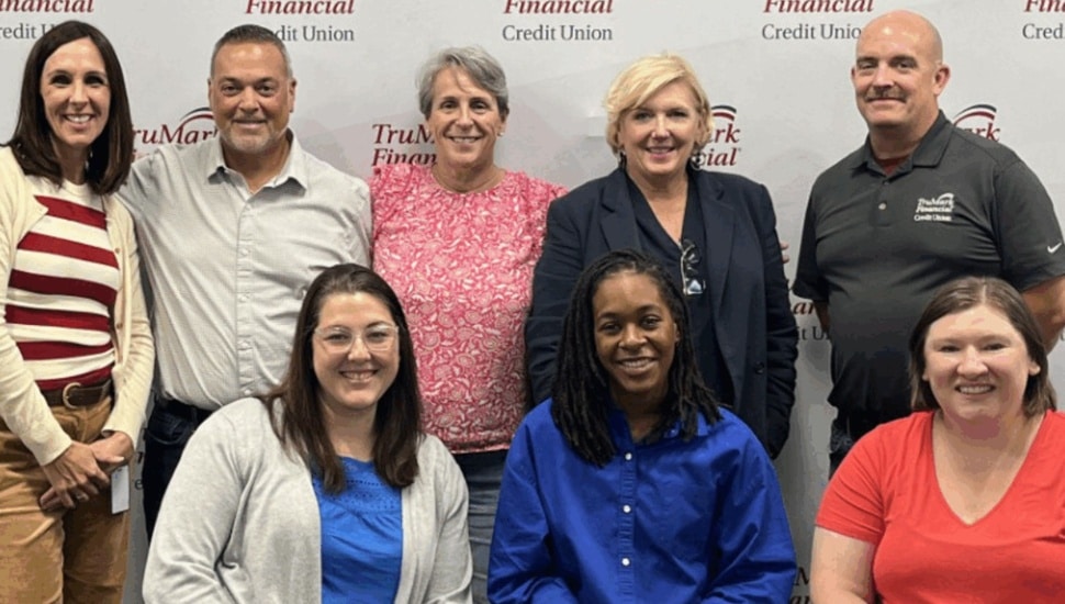 Group photo of credit union employees.