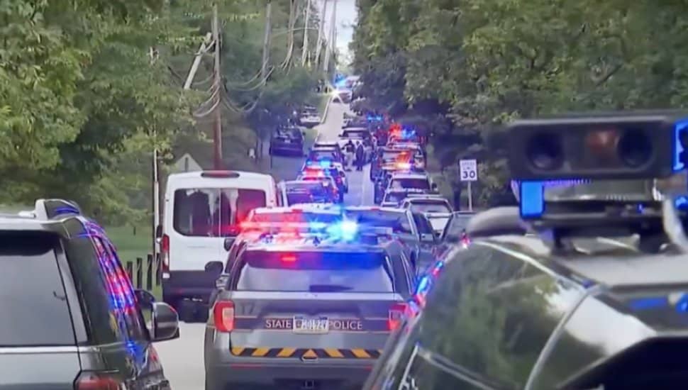 Police and SWAT vehicles line the streets during the Villanova swatting incident.