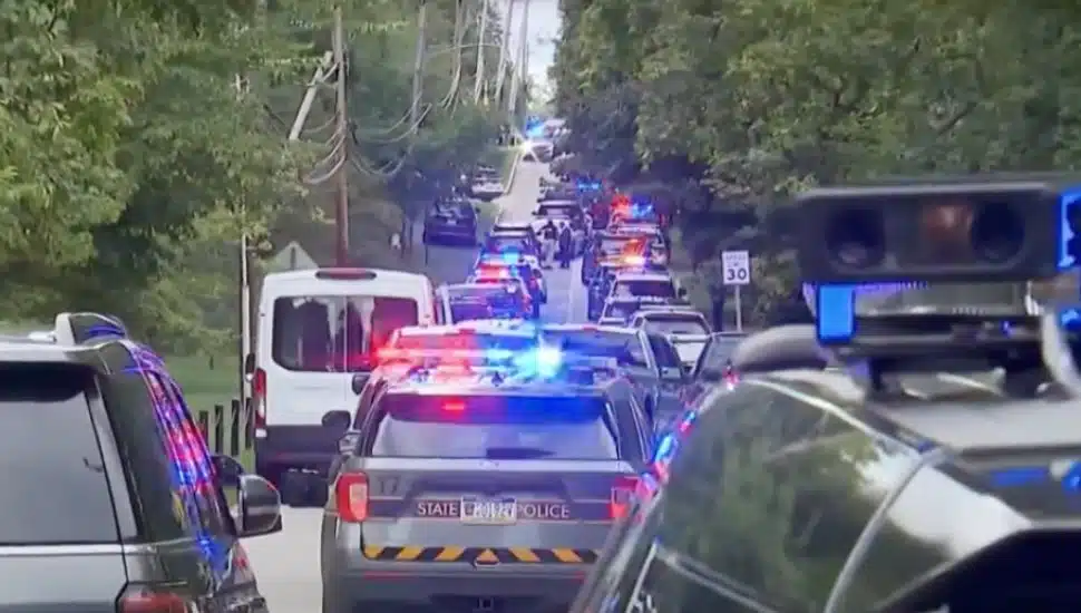 Police and SWAT vehicles line the streets during the Villanova swatting incident.