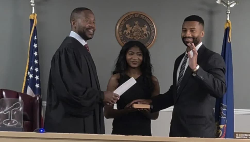 District Judge W Keith Williams II swore in his son, also named Keith, in his Lansdowne court room Friday after the younger Williams passed the bar exam.
