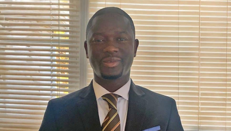 Portrait of Dr. Foday Kamara, a Wilmington University alumnus and doctorate recipient in Prevention Science, who is launching a nonprofit to support women’s human-rights and well-being globally.