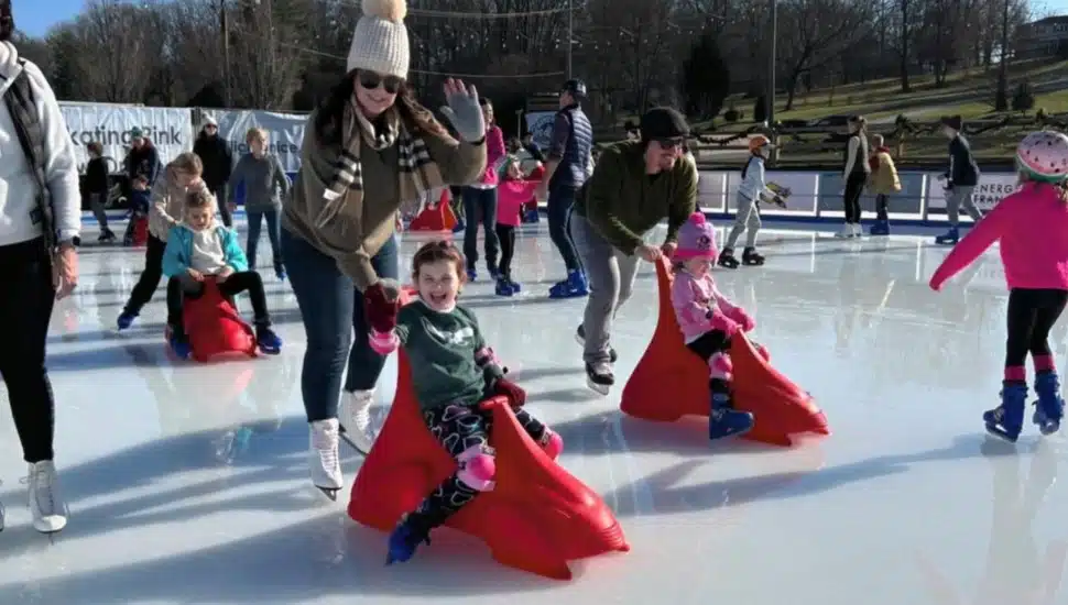 Men, women, and children enjoy ice skating at the Energy Transfer Veterans Memorial Rink in Newtown Square.