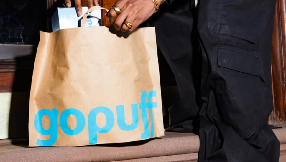 A paper bag with the GoPuff logo.