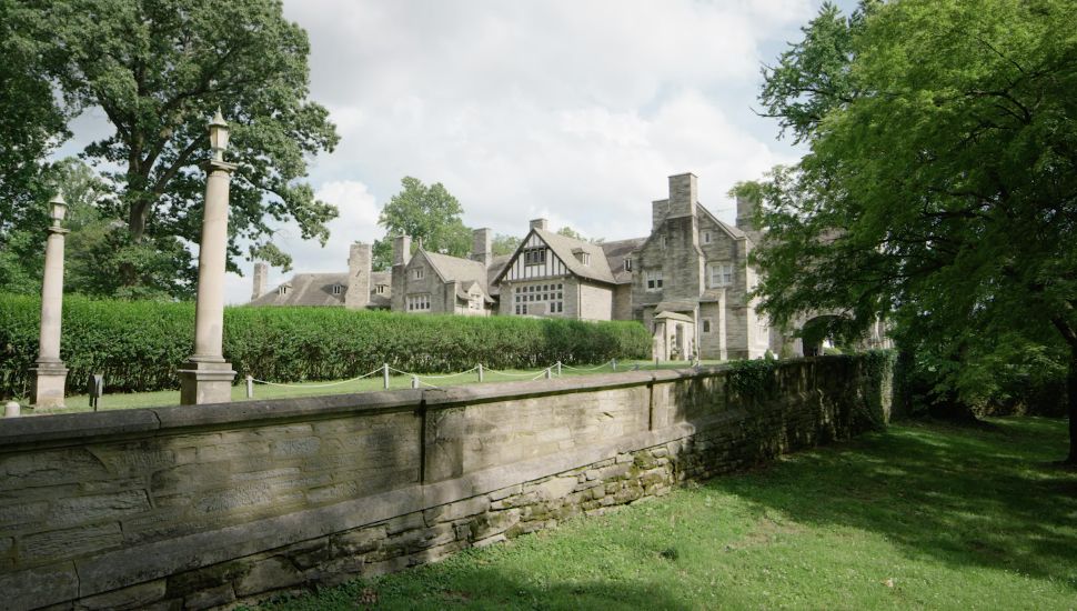 The exterior wall and mansion of Greystone Hall.