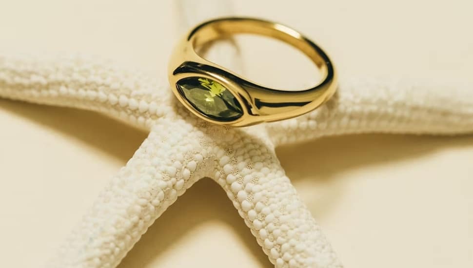 A ring rests on a Starfish.