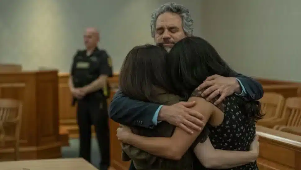 Tom Brandis (Mark Ruffalo) hugs his family after his son Ethan (Andrew Russel)'s parole hearing in the "Task" finale.