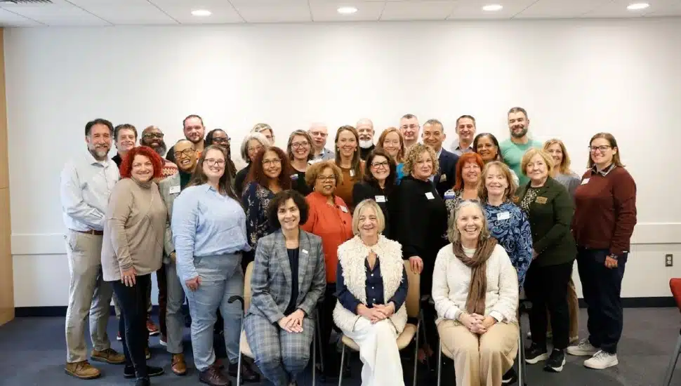 Leaders from Penn State Brandywine, Widener, and Delaware County Community College gather for a group photo.