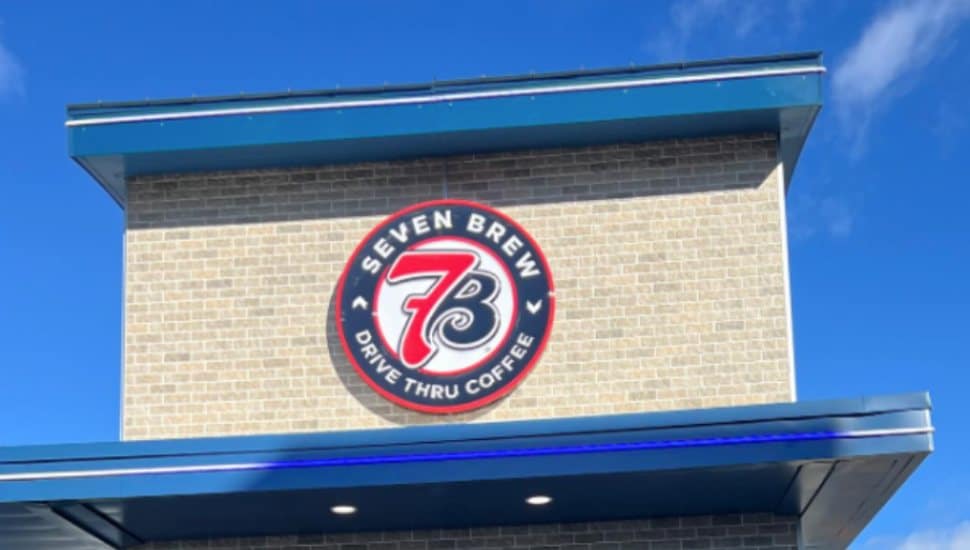 The exterior building and sign for 7 Brew Coffee.