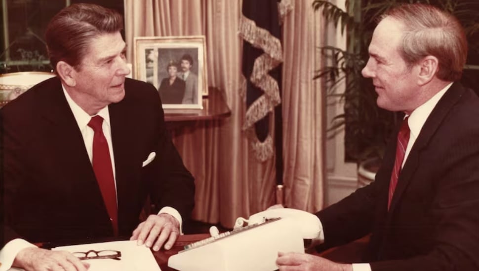 Former U.S. Rep. Richard "Dick" Schulze (right) sits with former President Ronald Reagan.