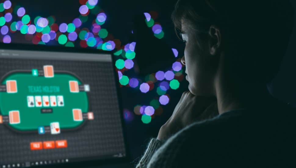 A woman plays online poker.