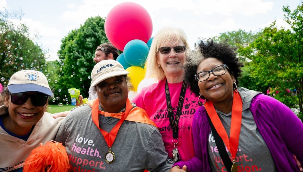Four participants in the Bubble Walk, an annual fundraiser for the Arc of Chester County.