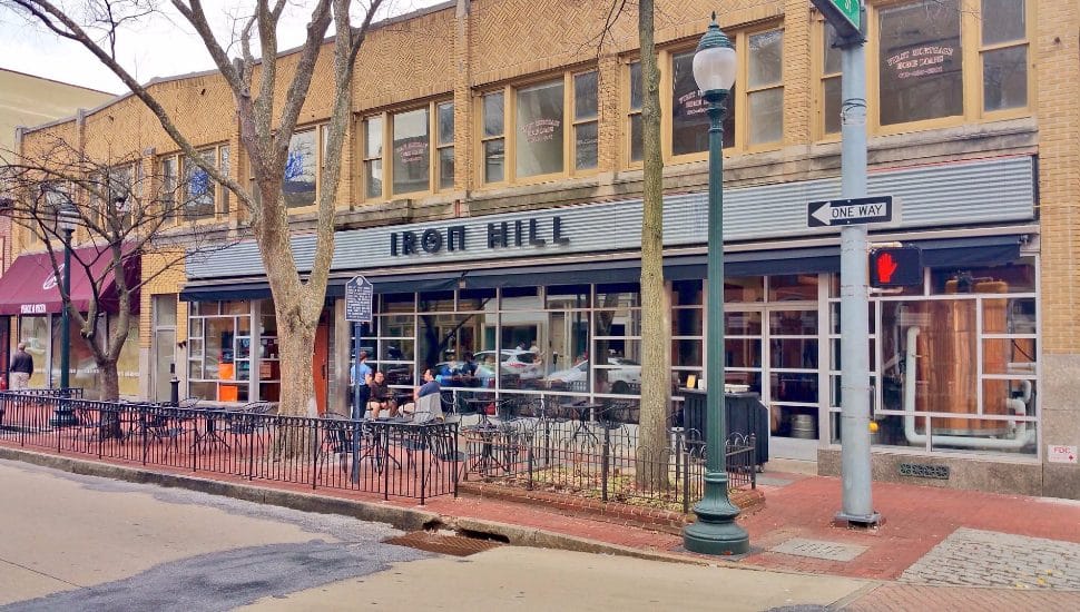 The exterior of an Iron Hill Brewery.