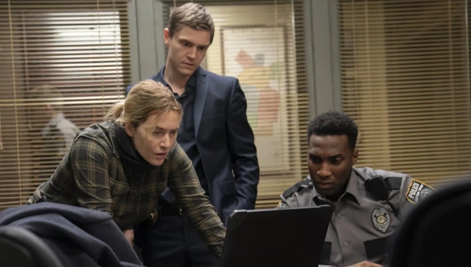 A scene from the first season of Mare of Easttown showing (from left) Kate Winslet, Evan Peters Nd Justin Hurtt-Dunkley.