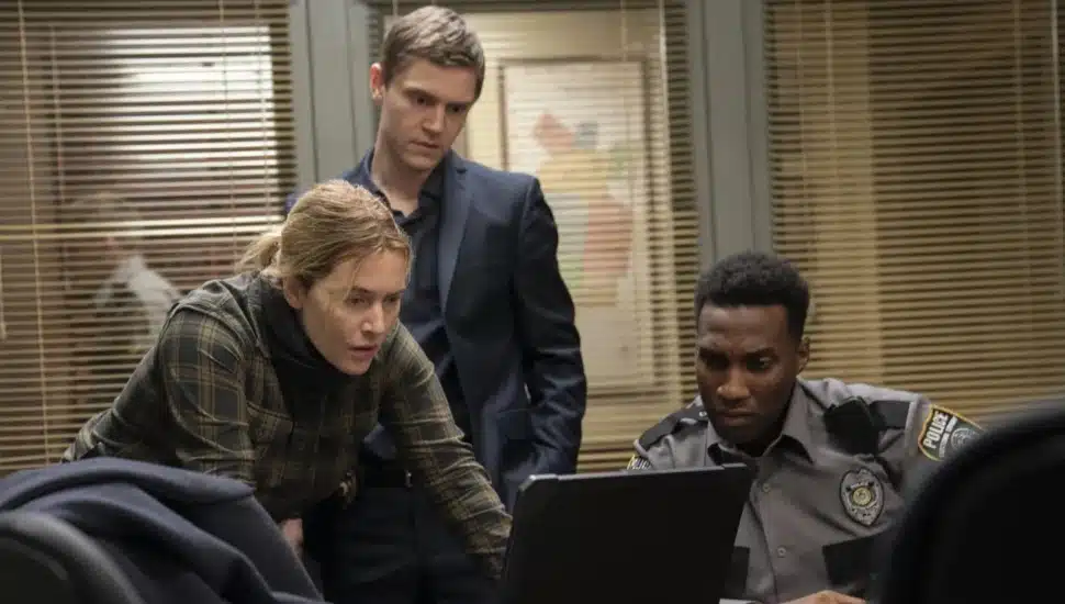 A scene from the first season of Mare of Easttown showing (from left) Kate Winslet, Evan Peters Nd Justin Hurtt-Dunkley.