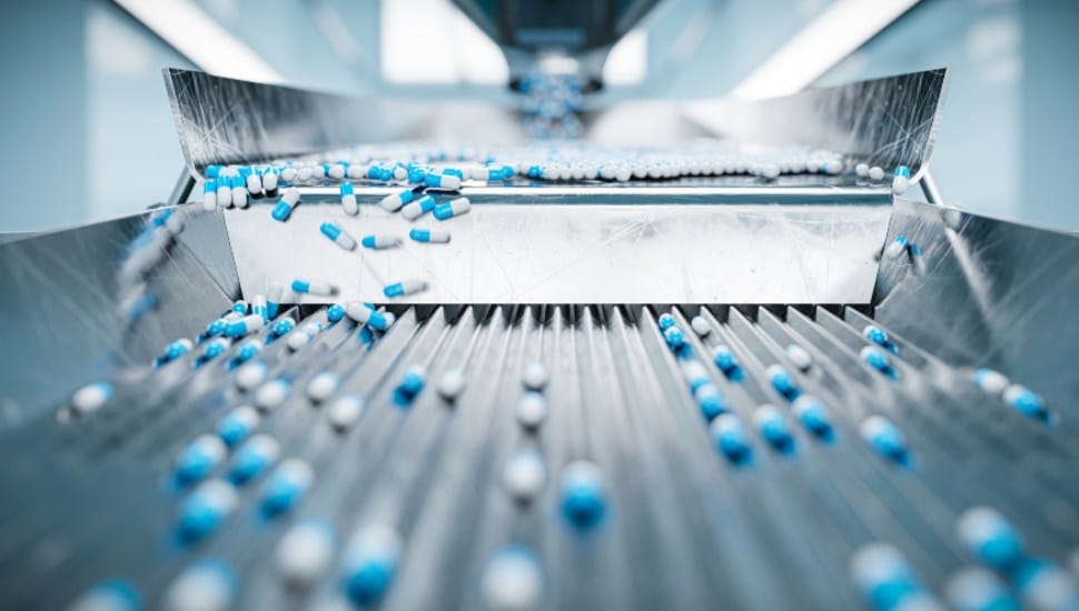 Prescription drugs on a conveyer belt.