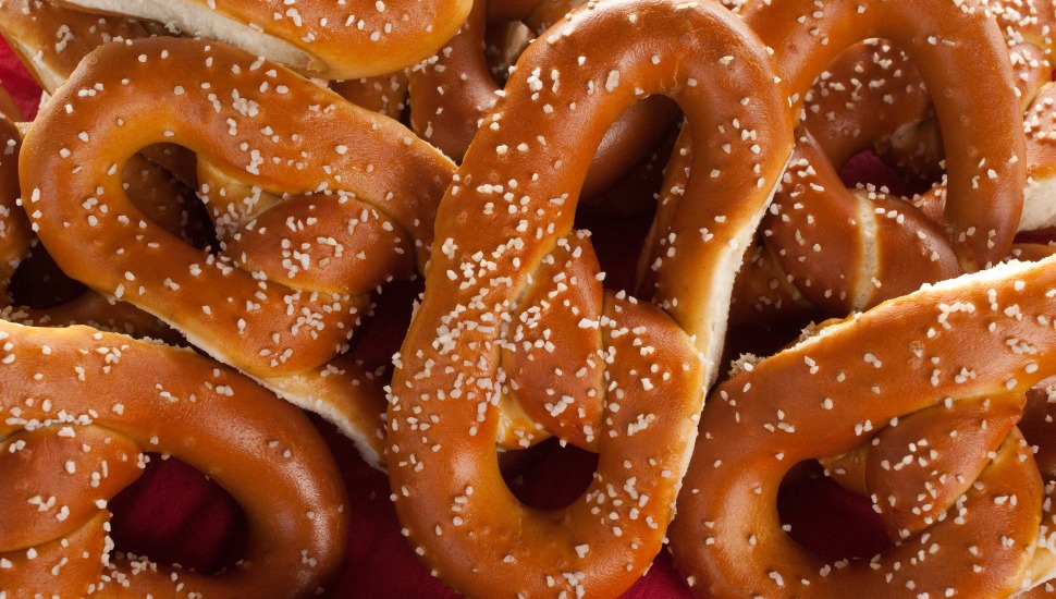 A pile of soft pretzels.