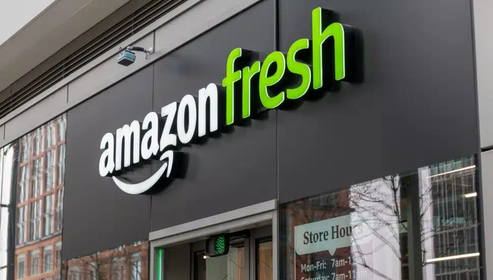 The sign and storefront for an Amazon Fresh grocery store.