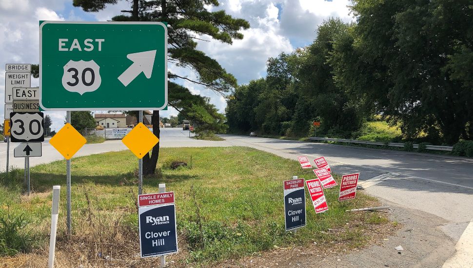 A Route 30 East sign.