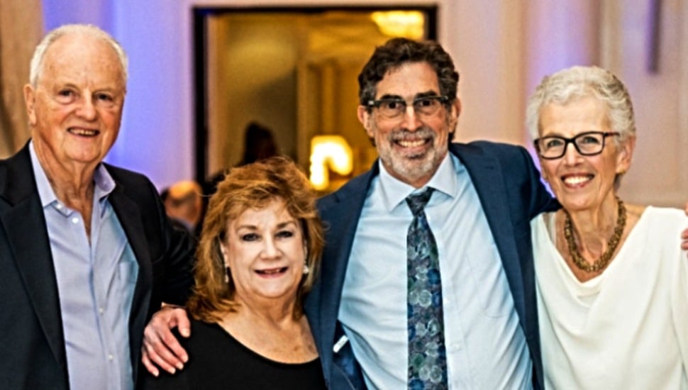 From left, Emeritus Professor J. Patrick Kelly, Connie Sweeney, Distinguished Professor Alan Garfield, and Paula Garrison, retired executive assistant to the dean.