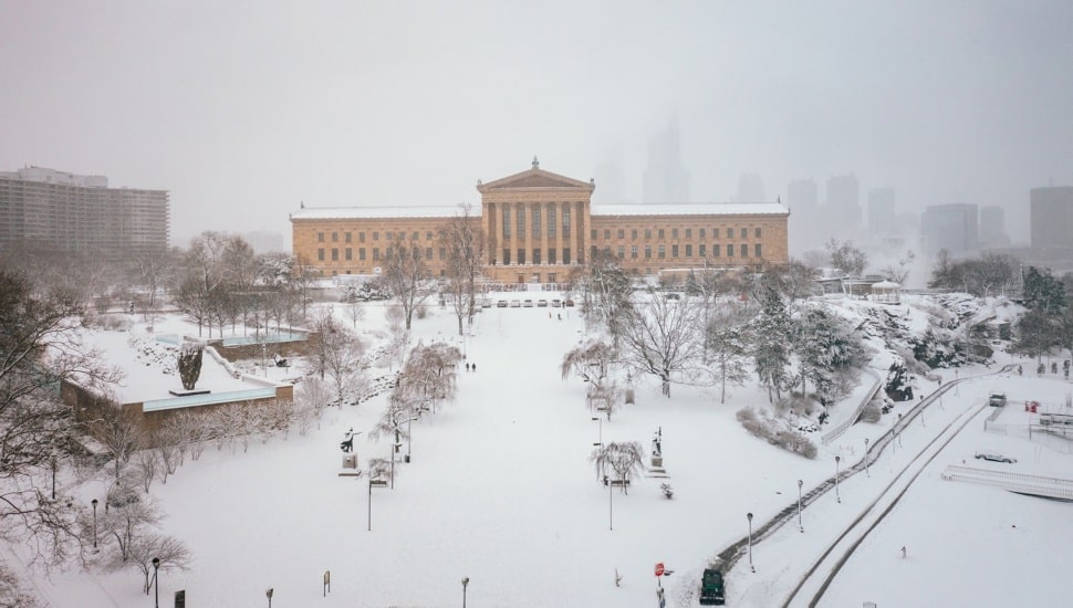 Aerial view of snow-covered Philadelphia Art Museum.