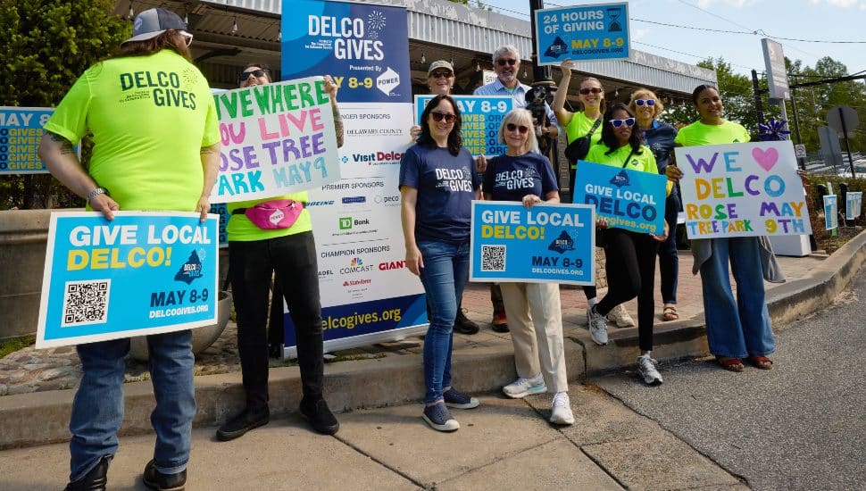 Last year, Delco Gives volunteers and staff from The Foundation for Delaware County held up signs to support for Delco Gives.