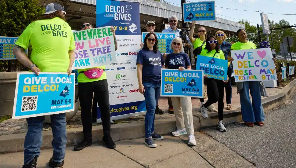 Last year, Delco Gives volunteers and staff from The Foundation for Delaware County held up signs to support for Delco Gives.