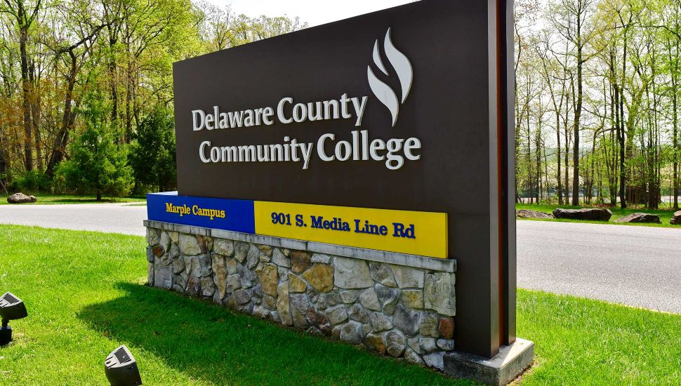DCCC campus sign on sunny day.