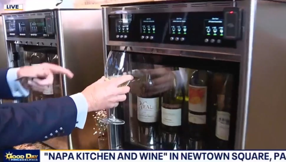 Trying out the wine dispenser at Napa Kitchen and Wine in Newtown Square.