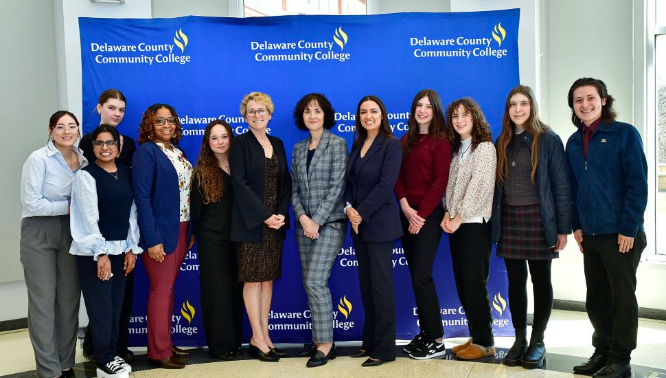 U.S. Representatives Houlahan and Ocasio-Cortez with DCCC students and DCCC president Dr. Marta Yera Cronin.