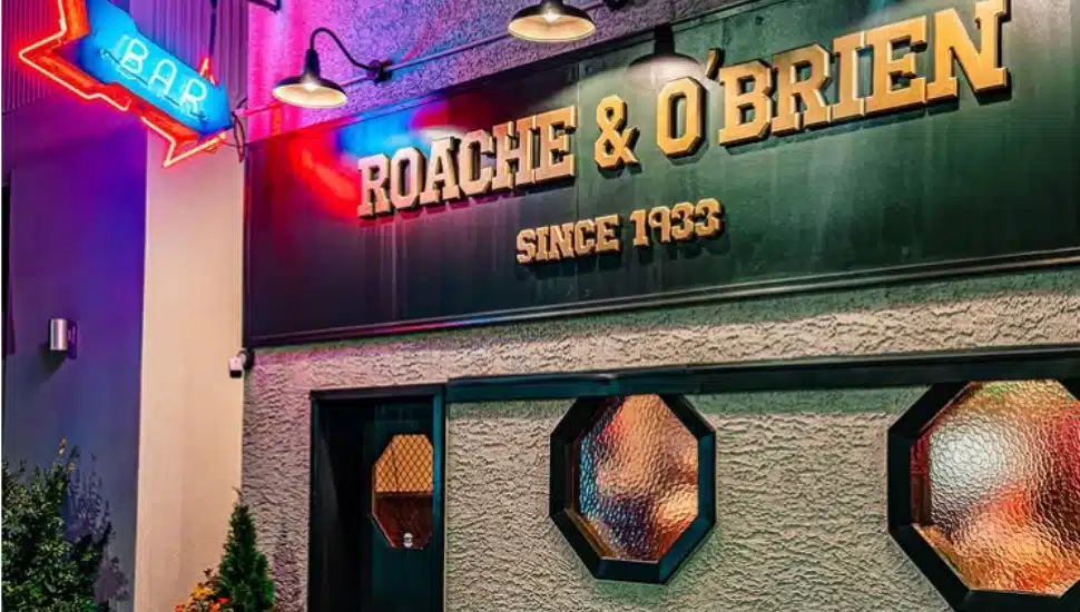 The entrance to the Roache & O’Brien pub in Havertown at nighttime.