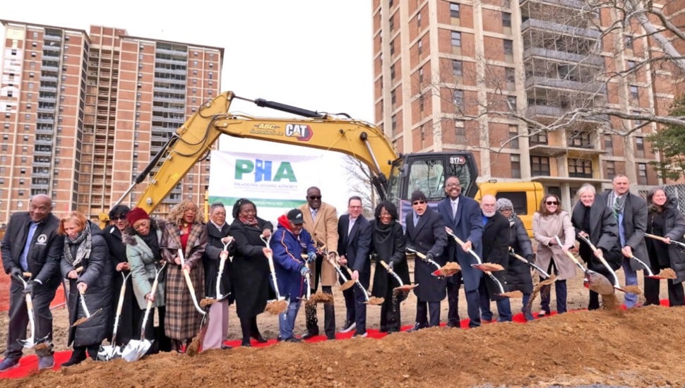 PHA and City officials with shovels.