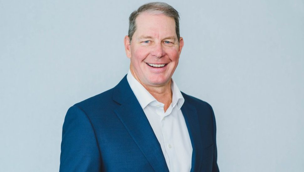 Peter Haabestad headshot wearing blue suit.
