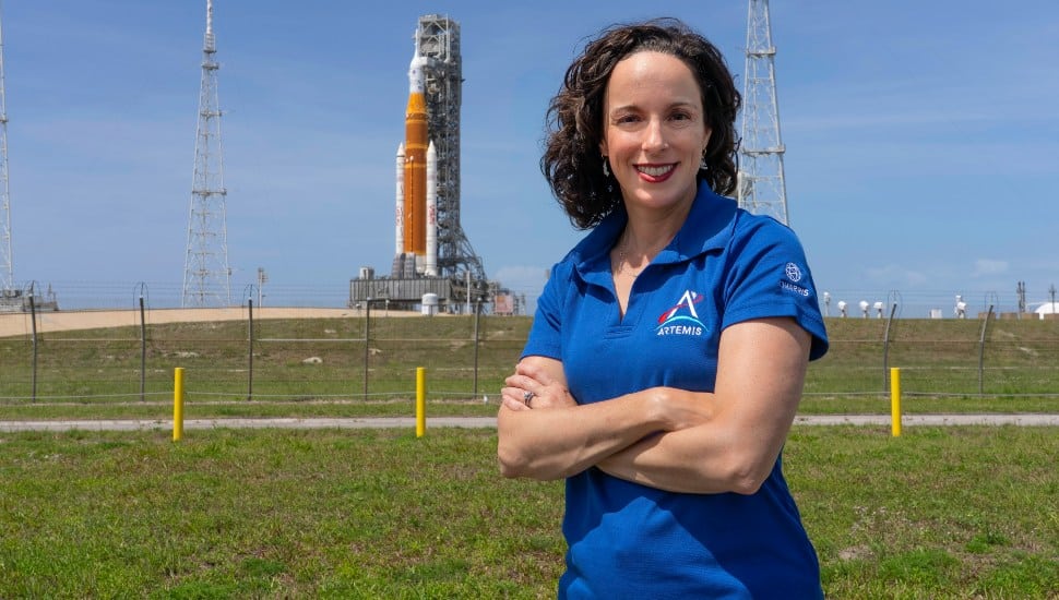 Kristin Houston, with the Artemis 2 on the launch pad in the background.