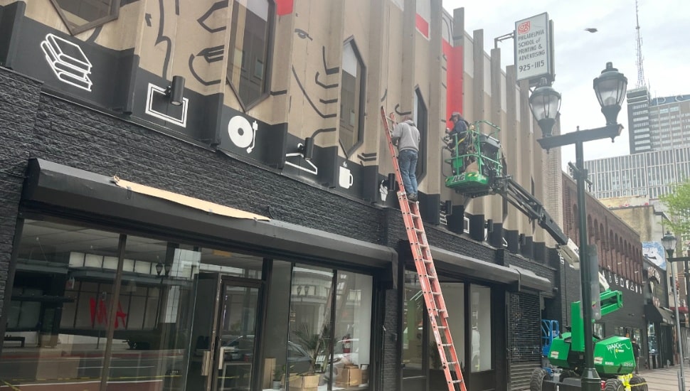 Construction for temporary storefronts on the 900 block of Market Street East.
