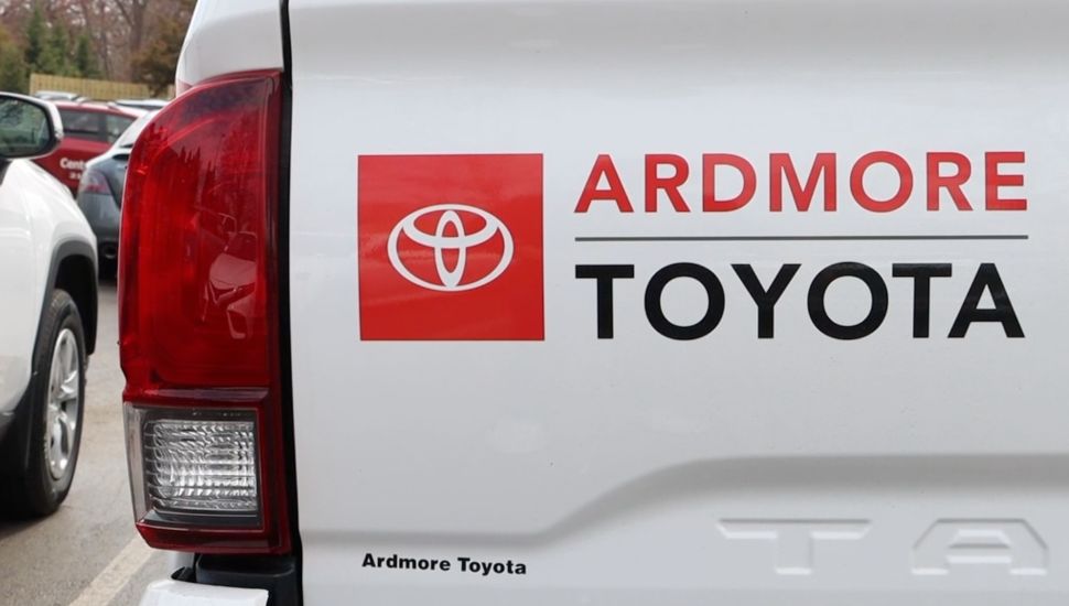 Ardmore Toyota reads on the tailgate of a white truck.