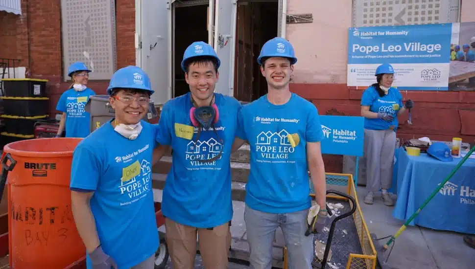 Some of the Villanova University student volunteers taking part in the groundbreaking of Pope Leo Village, a 26-home Habitat for Humanity project in North Philadelphia.