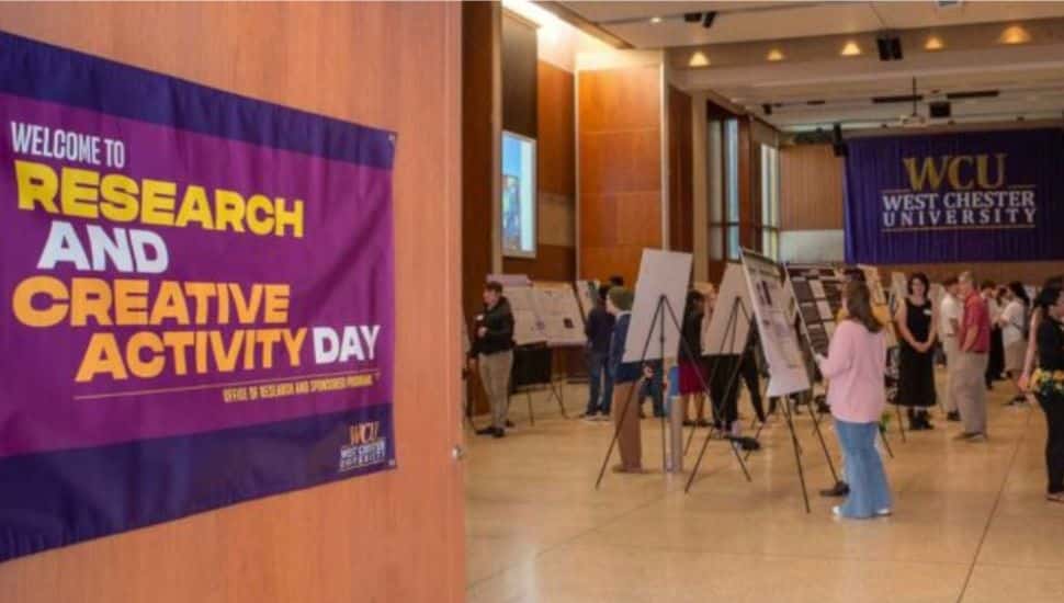 Students present research posters and discuss projects during West Chester University’s Research and Creative Activity Day.