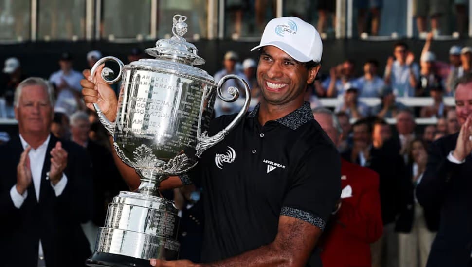 Aaron Rai holding the Wanamaker Trophy after his 2026 PGA Championship win.