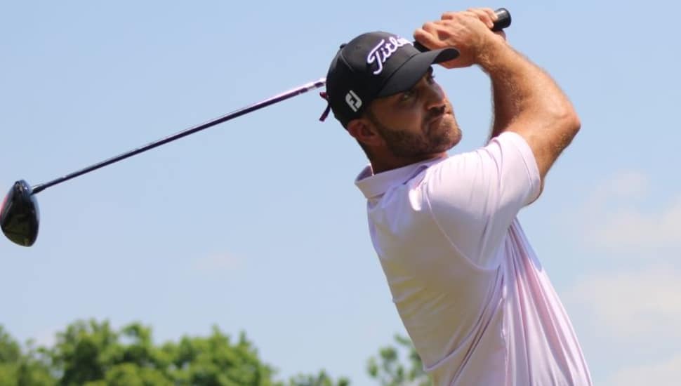 Branden Shattuck in mid-golf swing.